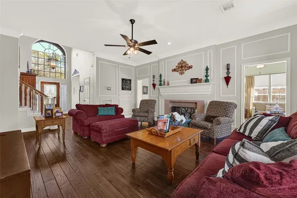 a view of a backyard with plants and a patio