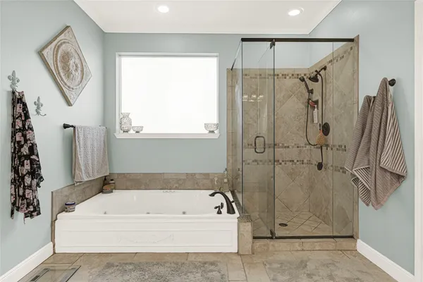 a view of a patio with table and chairs