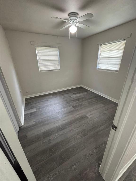 200 Magnolia Street Altamonte Springs, FL 32701 - Photo 2 of 6 a view of empty room with wooden floor and fan