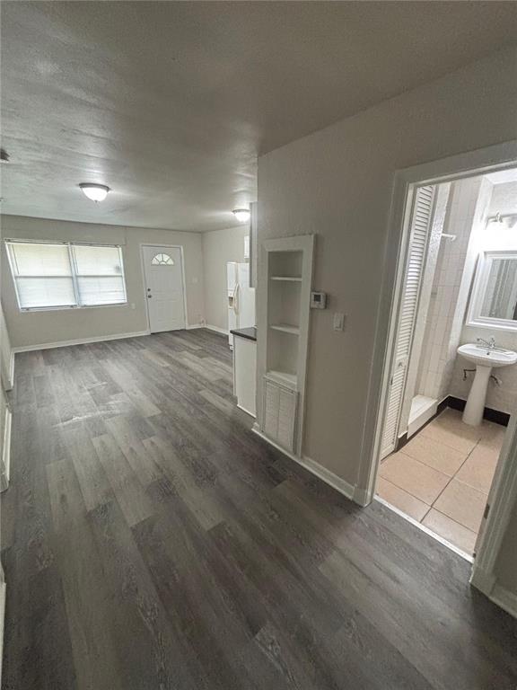 200 Magnolia Street Altamonte Springs, FL 32701 - Photo 6 of 6 an empty room with wooden floor and windows