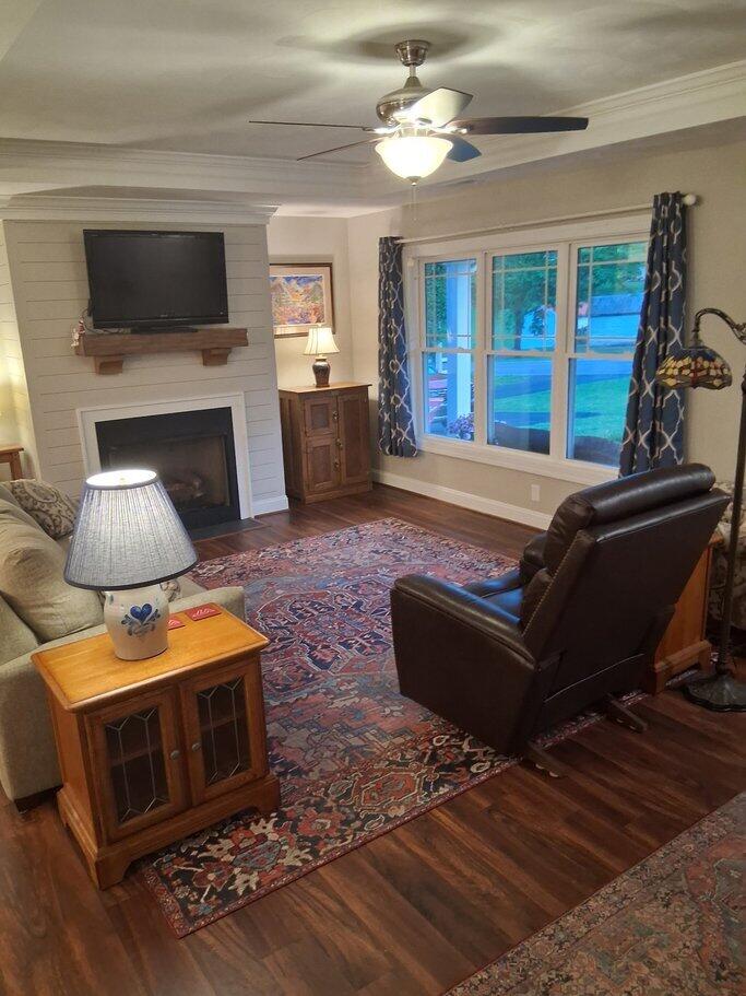 2348 East Ruritan Road Roanoke, VA 24012 - Photo 14 of 31 a living room with furniture a flat screen tv and a fireplace