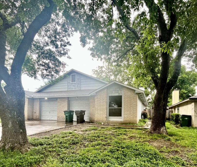 2114 Redwing Way Round Rock, TX 78664 - Photo 2 of 8 Ranch-style house featuring brick siding and concrete driveway