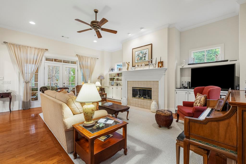202 White Oak Road Pine Mountain, GA 31822 - Photo 20 of 70 a living room with furniture a fireplace and a window