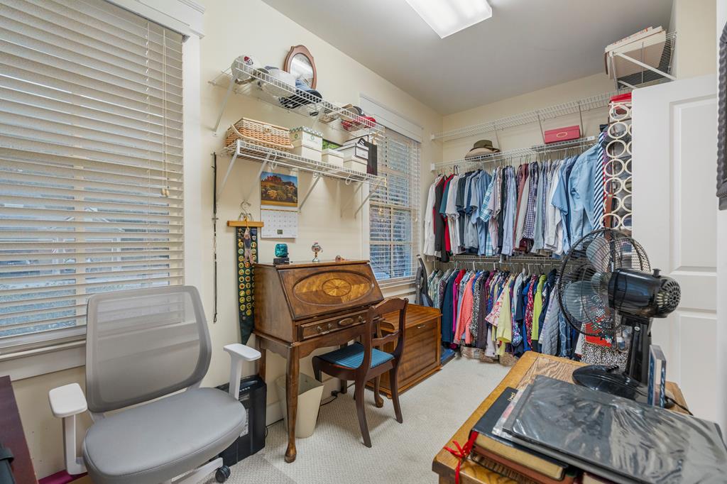 202 White Oak Road Pine Mountain, GA 31822 - Photo 36 of 70 a view of walk in closet with clothes and shoes