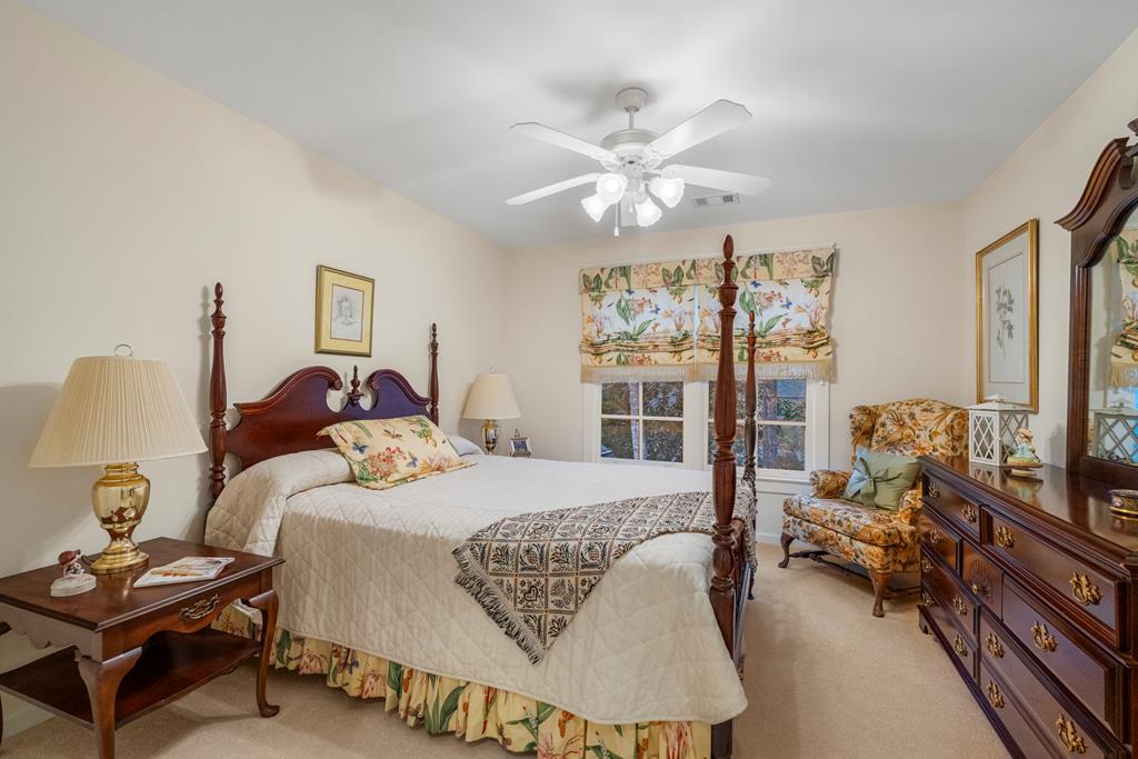 202 White Oak Road Pine Mountain, GA 31822 - Photo 38 of 70 a bed room with a bed and a chair