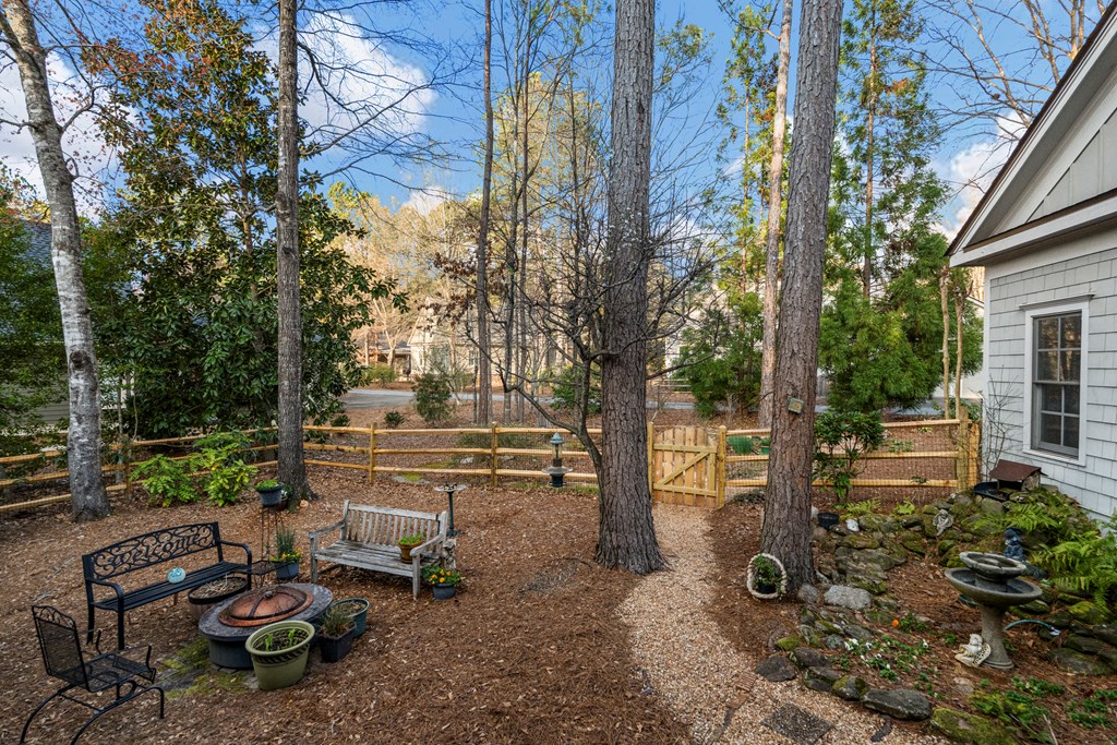 202 White Oak Road Pine Mountain, GA 31822 - Photo 6 of 70 a view of a bench in backyard of the house