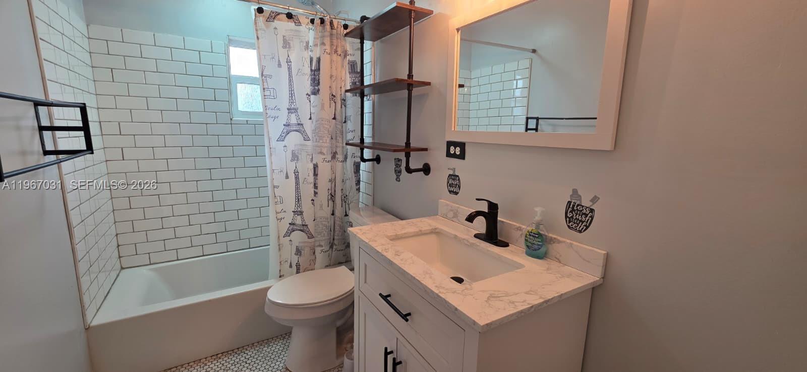 5900 Atlanta Street Hollywood, FL 33021 - Photo 16 of 21 a bathroom with a sink toilet and shower