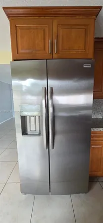 a close view of a refrigerator in kitchen