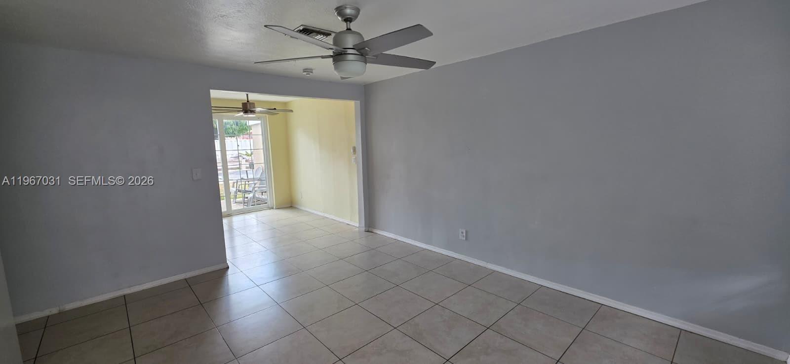 5900 Atlanta Street Hollywood, FL 33021 - Photo 7 of 21 an empty room with a empty space and windows