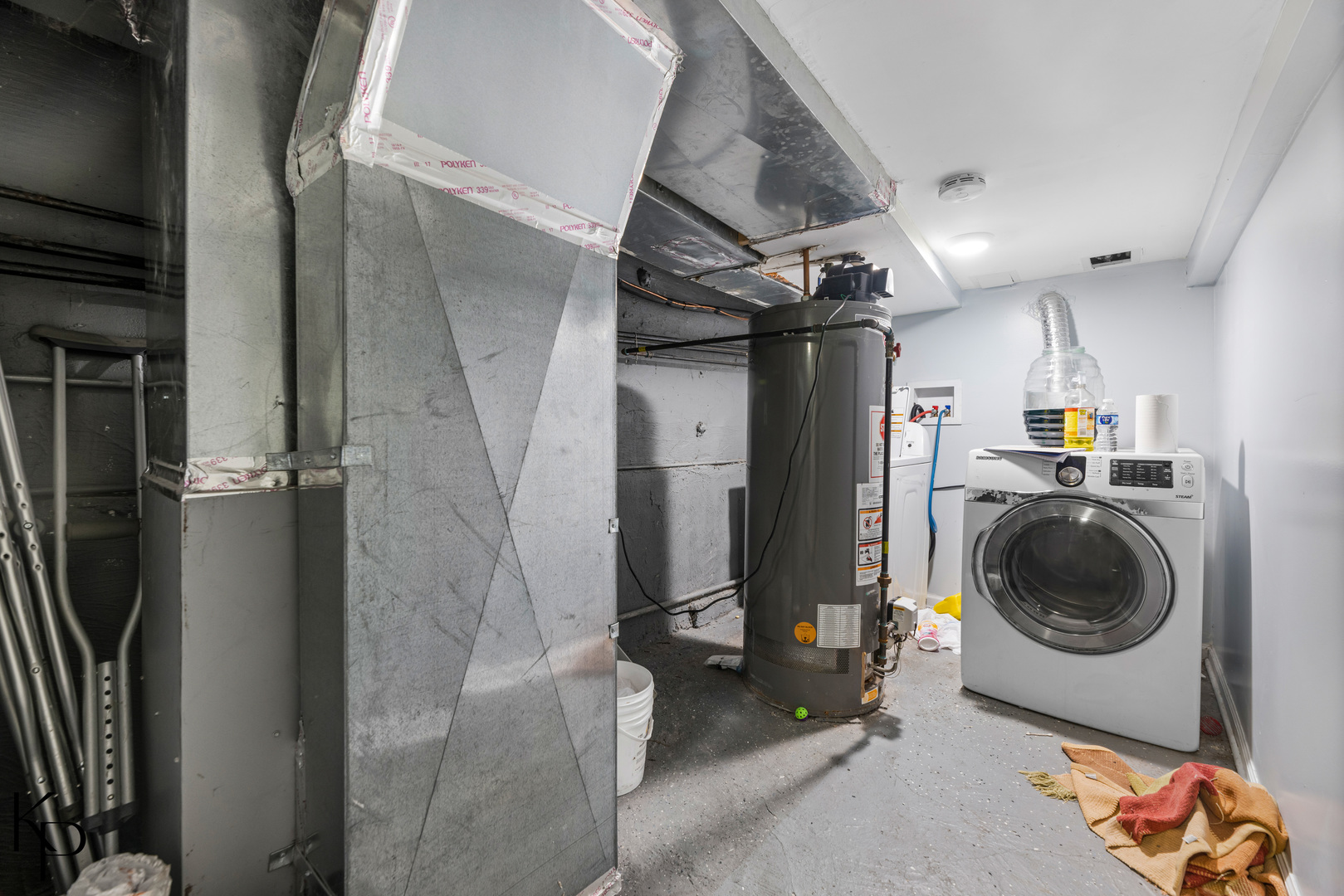 1117 West 57th Street Chicago, IL 60621 - Photo 8 of 9 a utility room with dryer and washer