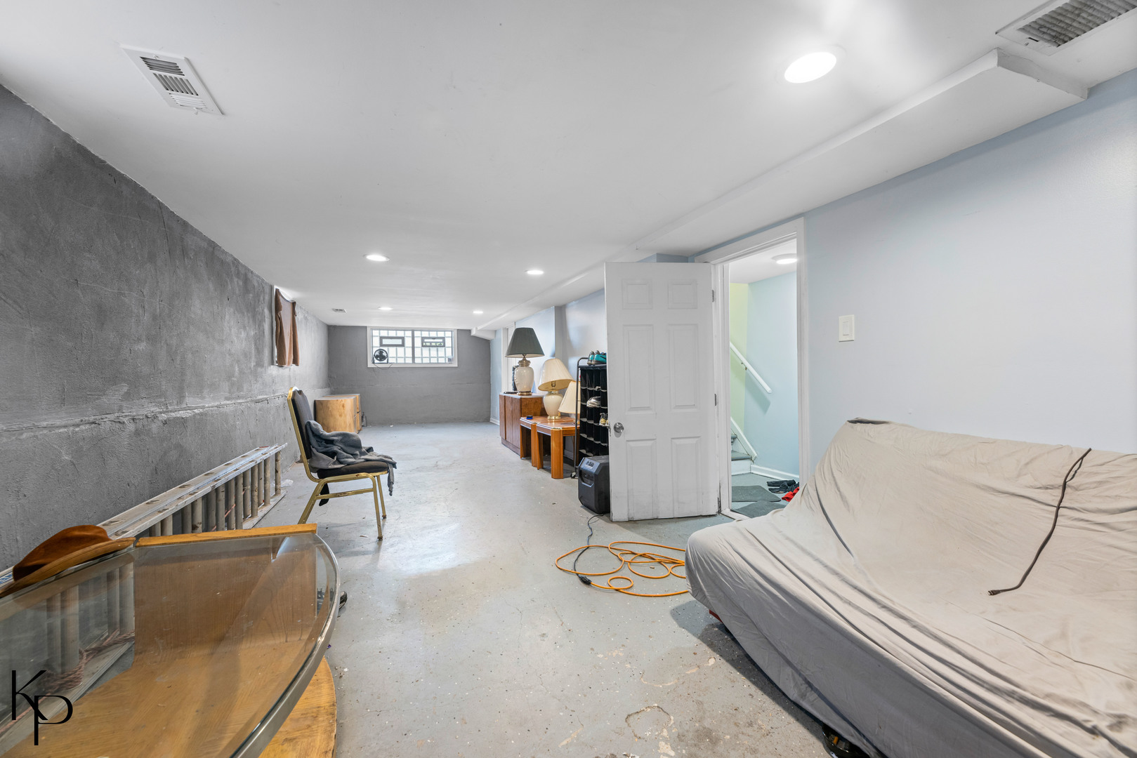 1117 West 57th Street Chicago, IL 60621 - Photo 9 of 9 a living room with furniture and wooden floor