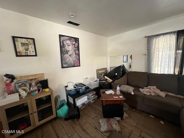 445 Millard Street Moorpark, CA 93021 - Photo 7 of 9 a living room with furniture with wooden floor