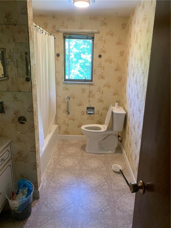 801 Beaver Road Greensburg, PA 15601 - Photo 11 of 20 a bathroom with a toilet a sink and a shower