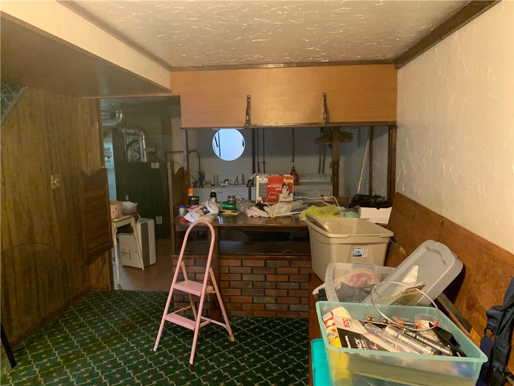 801 Beaver Road Greensburg, PA 15601 - Photo 15 of 20 a living room with a couch and a stove