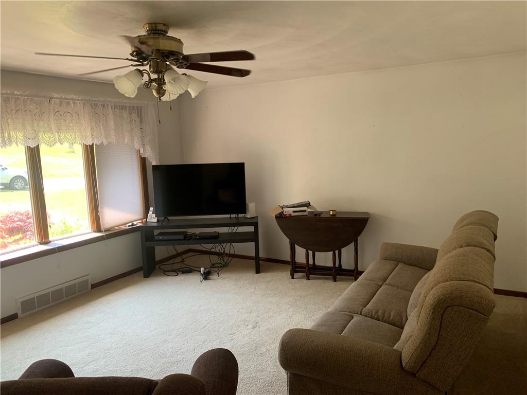801 Beaver Road Greensburg, PA 15601 - Photo 4 of 20 a living room with furniture and a flat screen tv