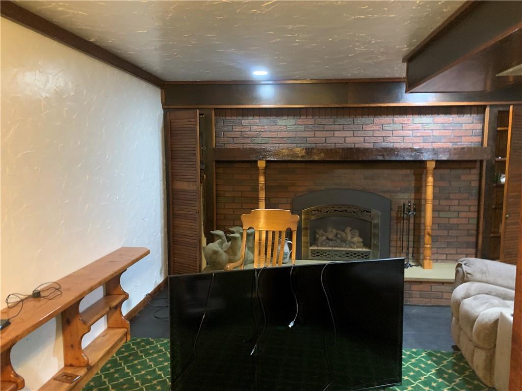 801 Beaver Road Greensburg, PA 15601 - Photo 5 of 20 a room with furniture and a fireplace