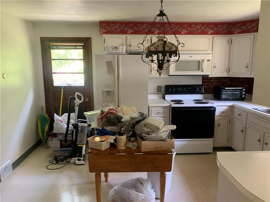 801 Beaver Road Greensburg, PA 15601 - Photo 8 of 20 a view of a workspace with furniture and a window