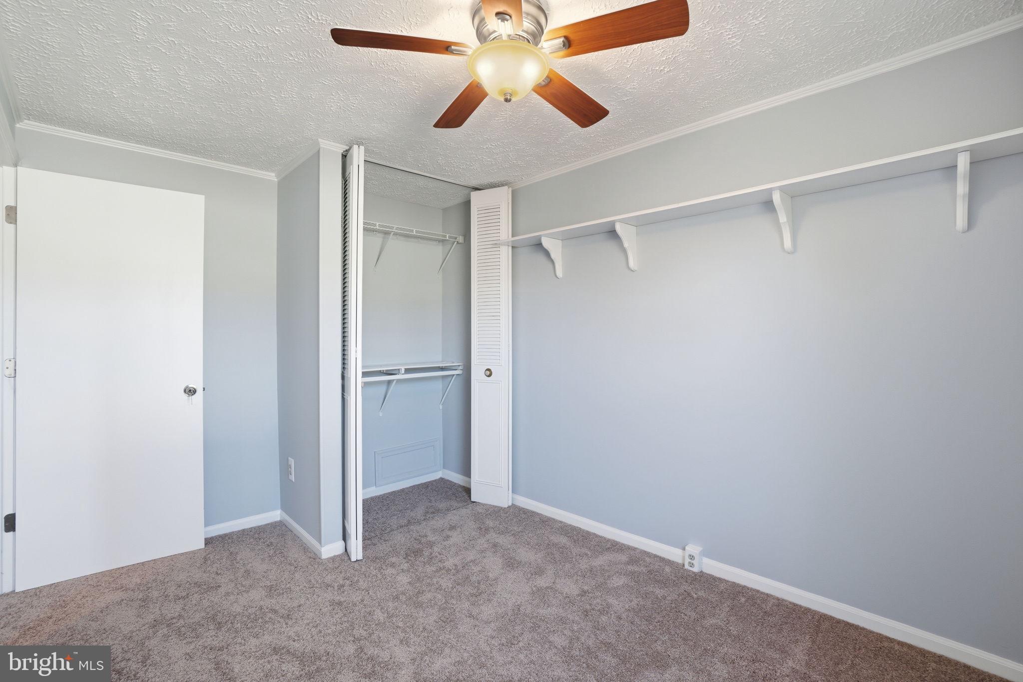 7470 Wounded Knee Road Lorton, VA 22079 - Photo 13 of 24 a view of an empty room