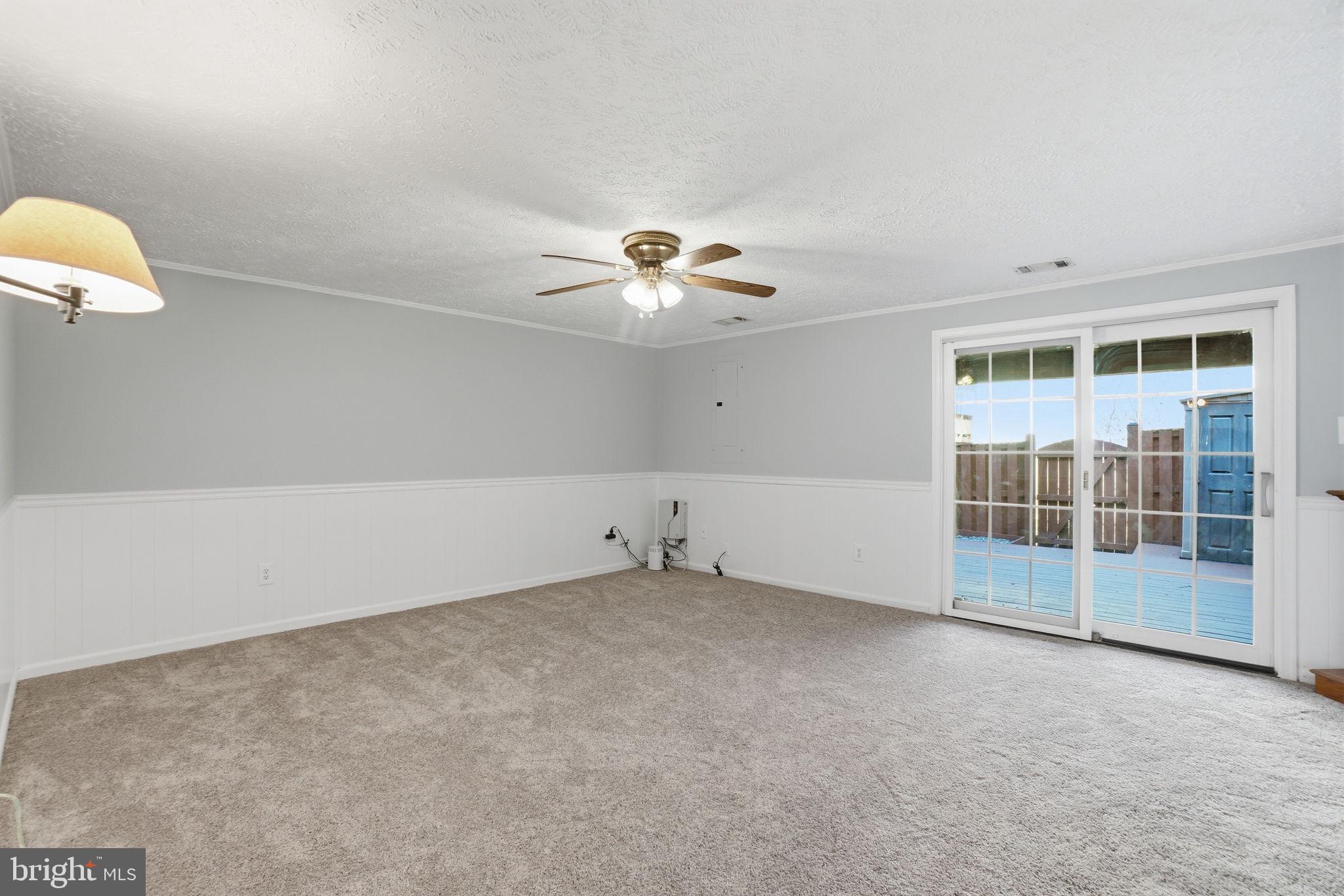 7470 Wounded Knee Road Lorton, VA 22079 - Photo 18 of 24 an empty room with windows
