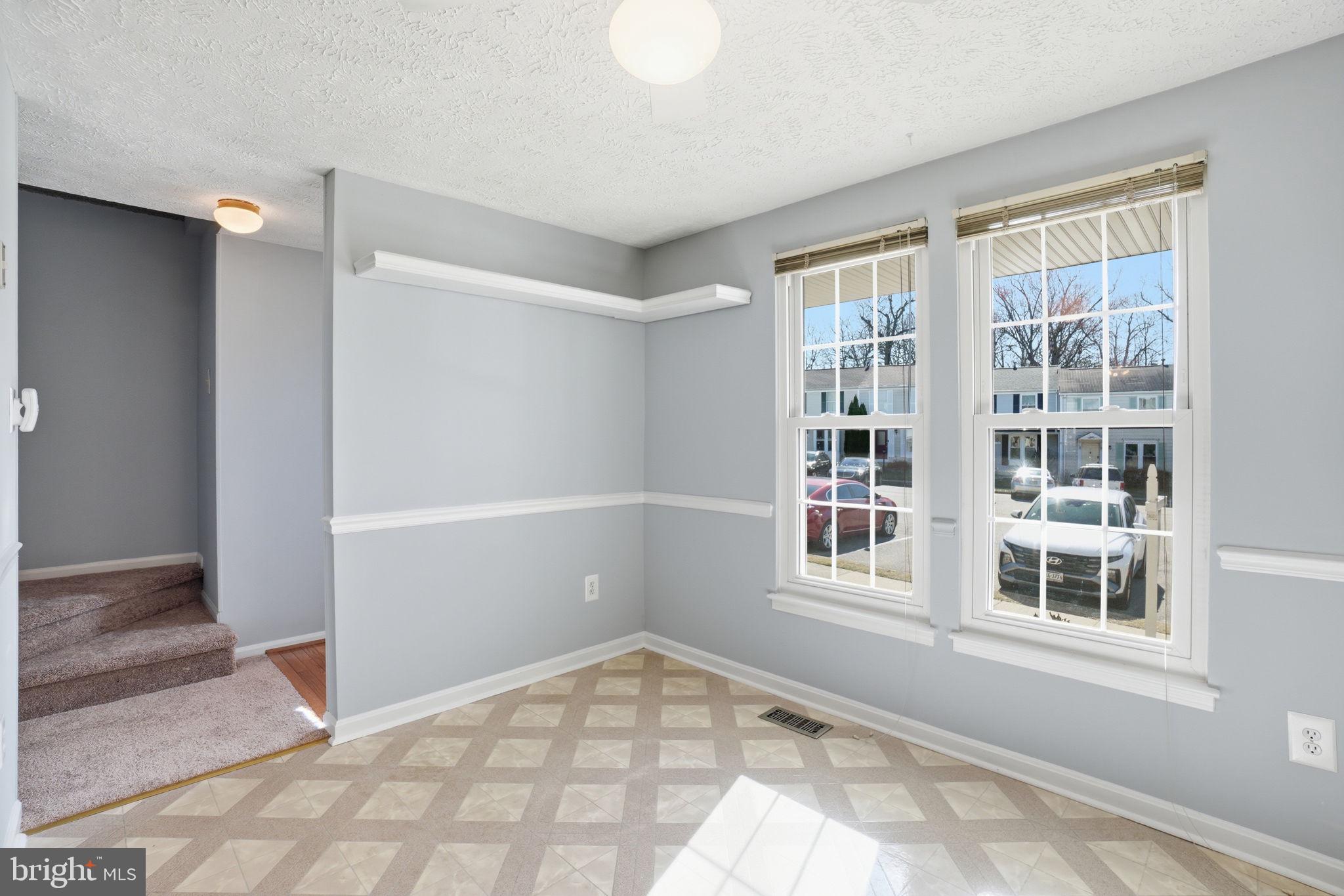7470 Wounded Knee Road Lorton, VA 22079 - Photo 3 of 24 a view of an empty room with a window