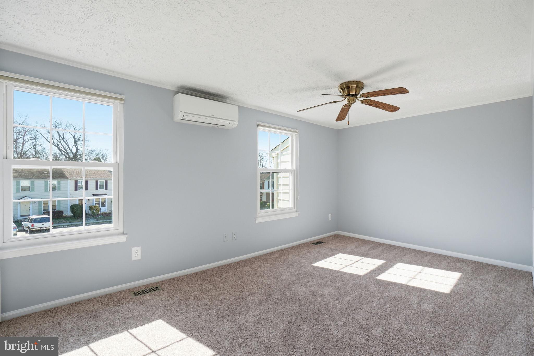 7470 Wounded Knee Road Lorton, VA 22079 - Photo 10 of 24 a view of empty room with windows