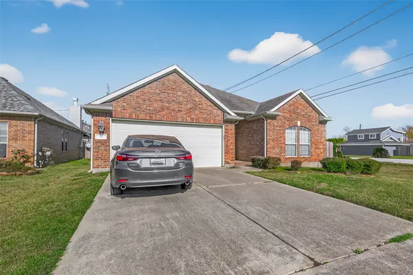 a view of a car in front of house
