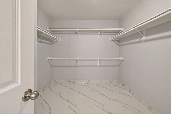 a view of a room with racks on the wall