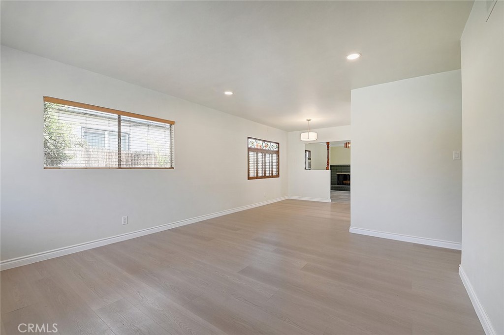 9118 Maple Street Bellflower, CA 90706 - Photo 21 of 74 a view of a big room with windows and cabinet