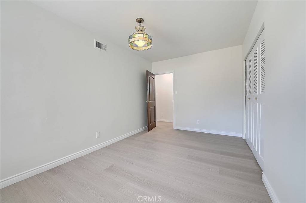 9118 Maple Street Bellflower, CA 90706 - Photo 41 of 74 a view of an empty room with a window