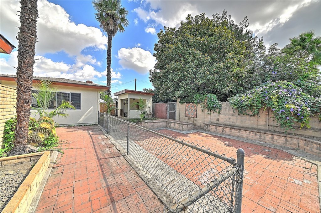 9118 Maple Street Bellflower, CA 90706 - Photo 57 of 74 a view of a house with backyard and sitting area