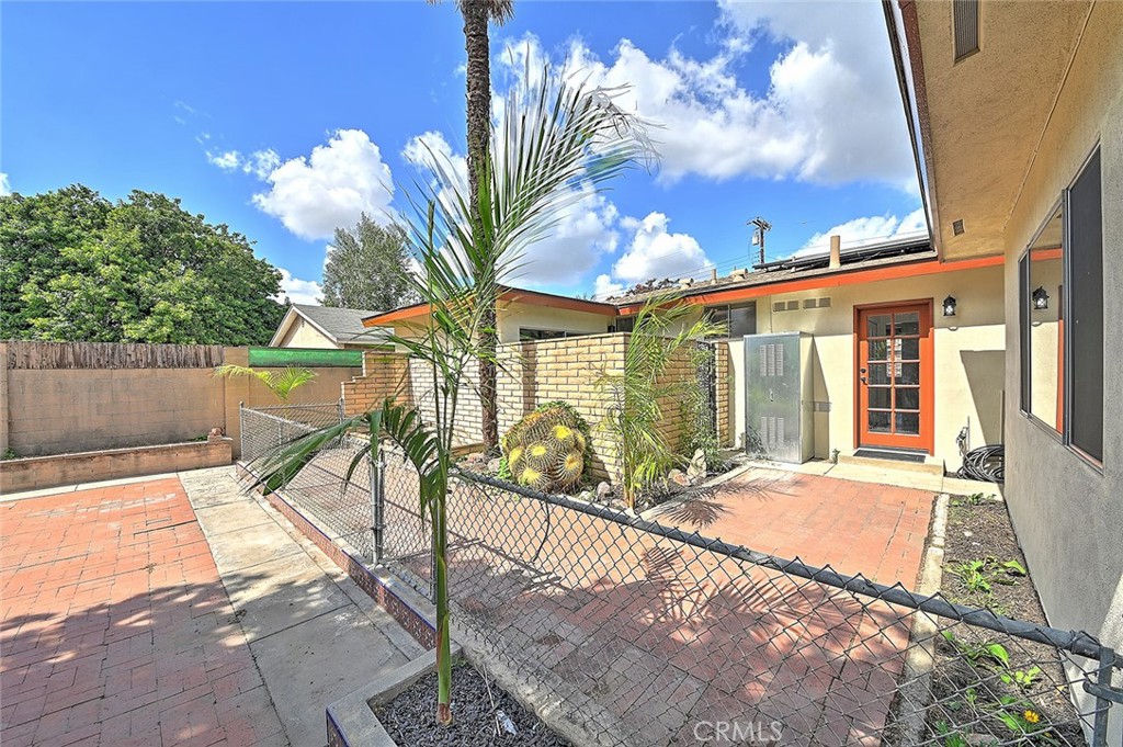 9118 Maple Street Bellflower, CA 90706 - Photo 62 of 74 a view of a house with backyard porch and patio
