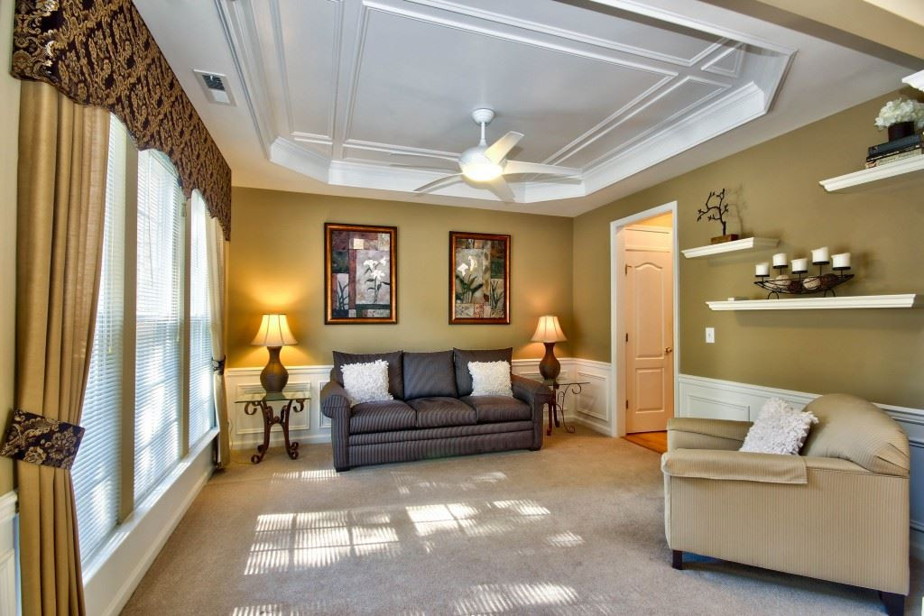7725 Monte Alto Drive Raleigh, NC 27613 - Photo 5 of 25 Stunning tray ceiling adds just the right touch of class to this formal living room. Read a great book in this room with all that natural light coming in! Living Room
