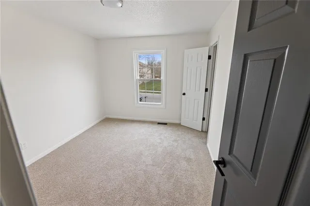 $399,000 | 909 Northeast 117th Terrace, Kansas City, MO 64155