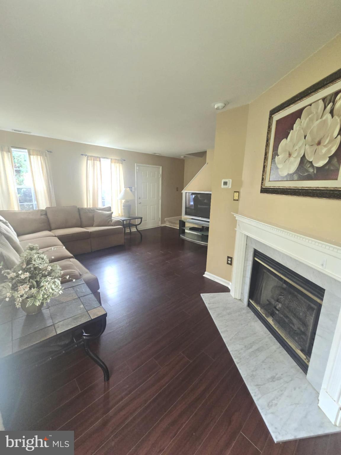 3505 Tall Pines Pine Hill, NJ 08021 - Photo 2 of 10 a living room with furniture and a fireplace