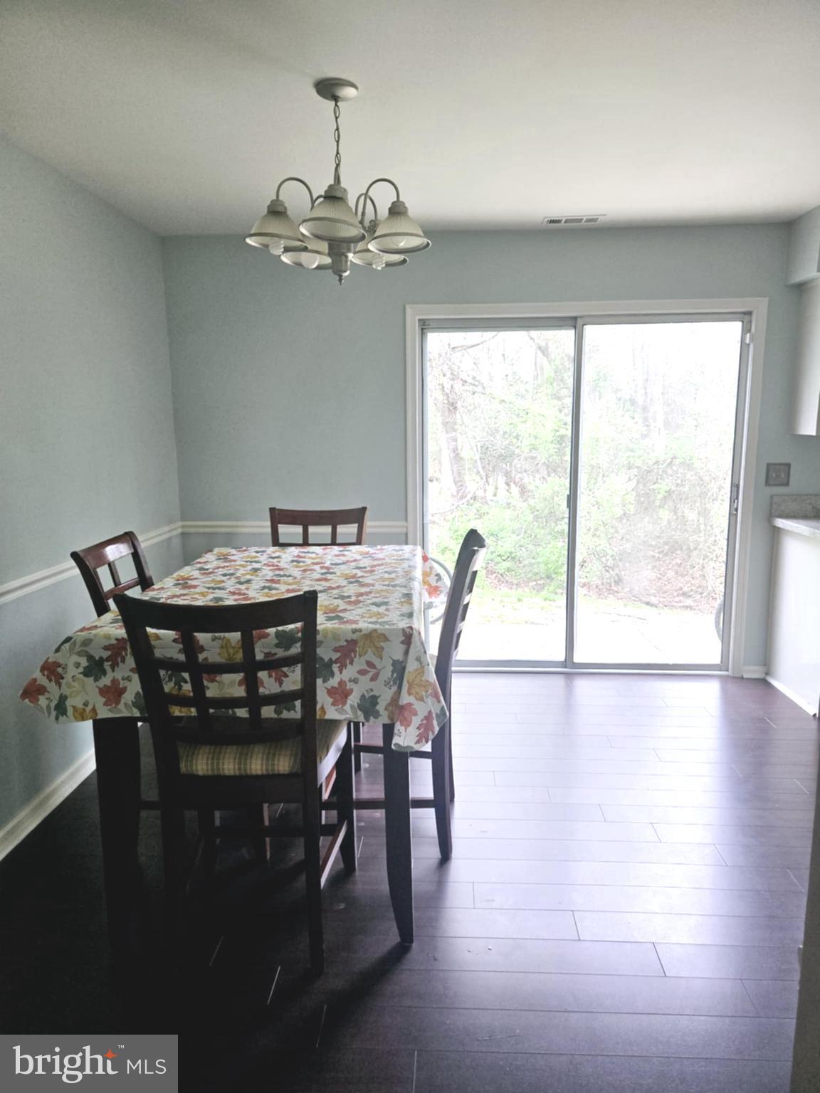 3505 Tall Pines Pine Hill, NJ 08021 - Photo 6 of 10 a view of a dining room with furniture window and outside view