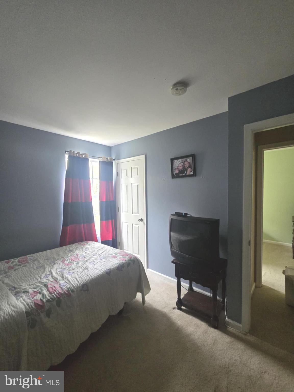 3505 Tall Pines Pine Hill, NJ 08021 - Photo 10 of 10 a bedroom with a bed and a chair in it