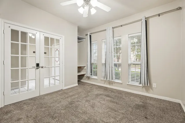 an empty room with windows