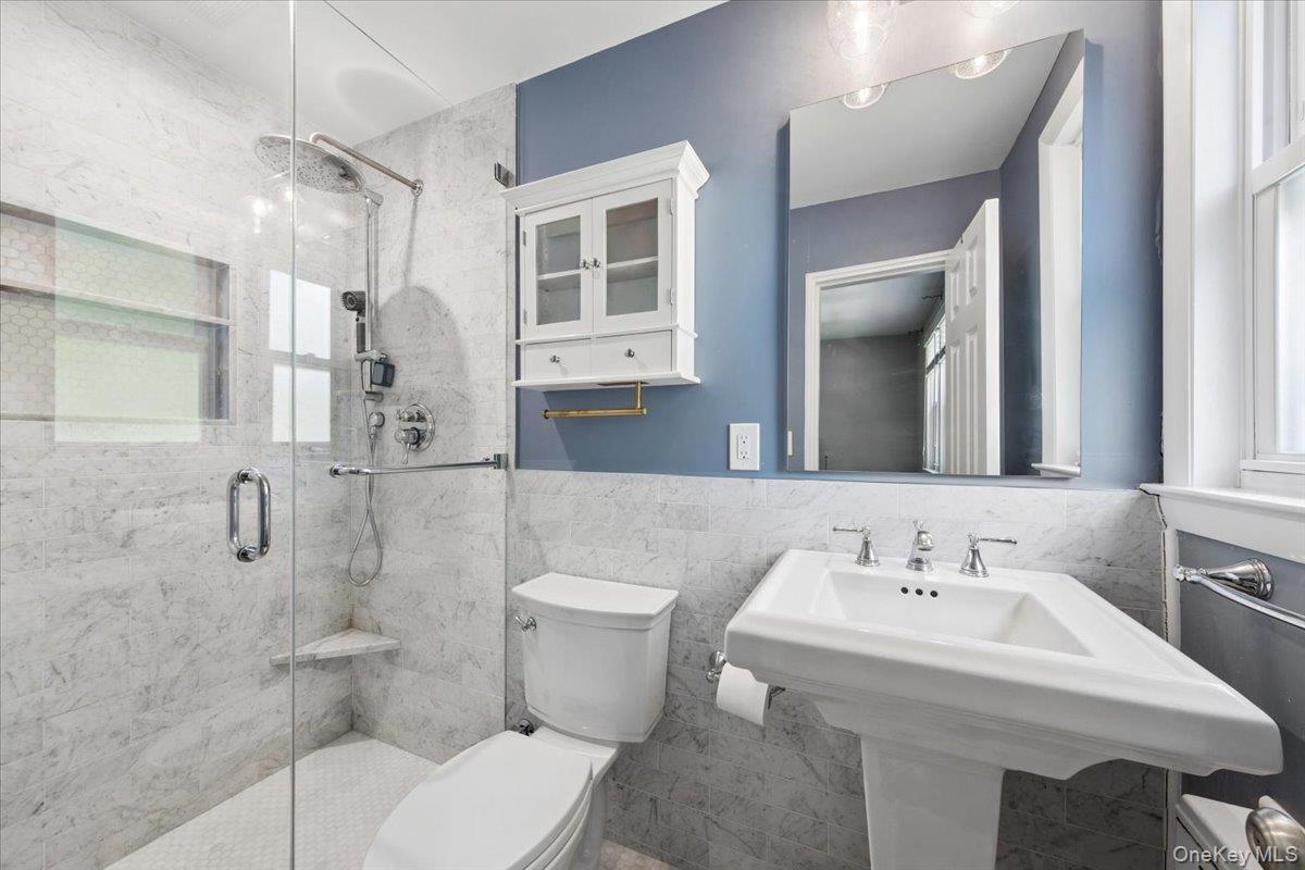 51 Avon Circle, Unit D Rye Brook, NY 10573 - Photo 19 of 30 Renovated Primary Bathroom includes a Walk-in Shower