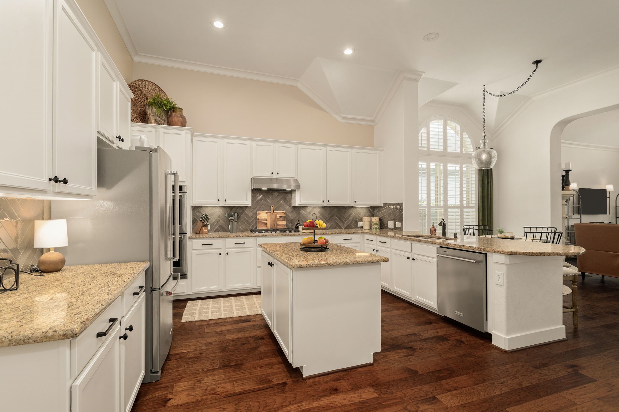 16650 Seminole Ridge Drive Cypress, TX 77433 - Photo 5 of 27 a kitchen with a sink stove cabinets and refrigerator