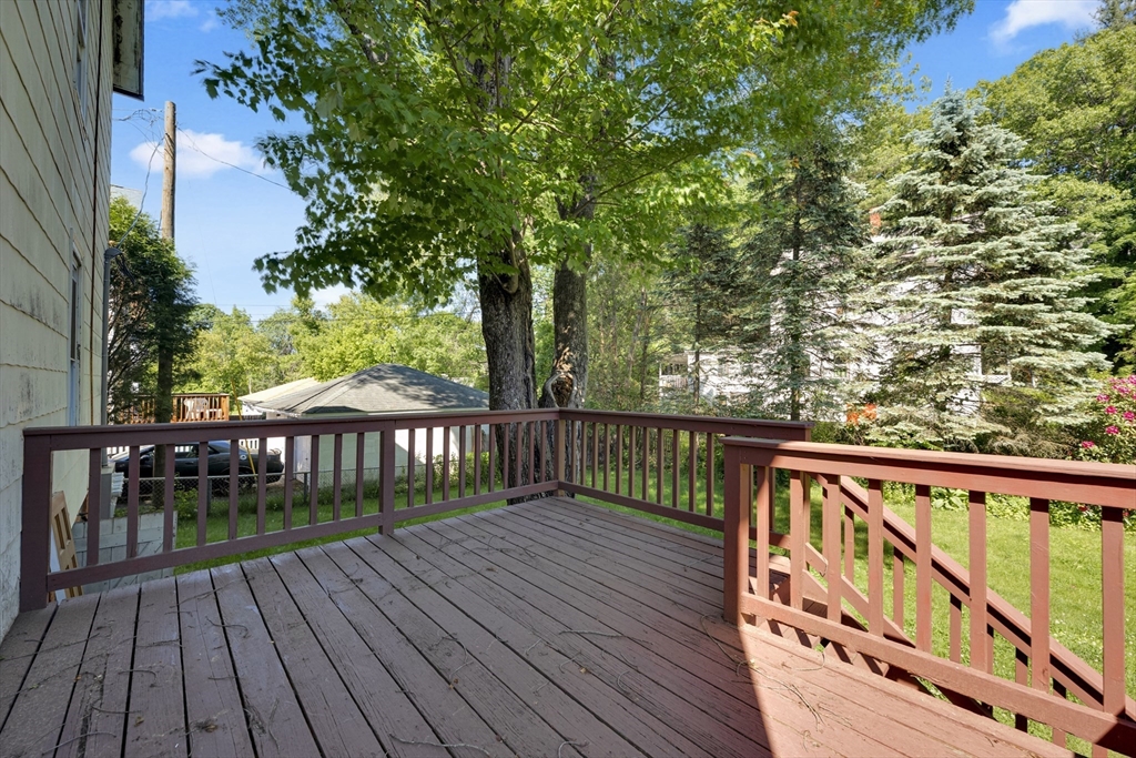 47 Morris Street Southbridge, MA 01550 - Photo 27 of 40 a view of balcony with wooden floor and fence