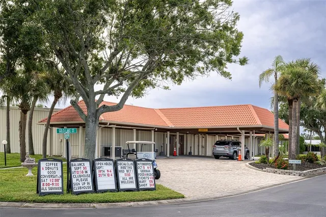 a front view of a building with garden