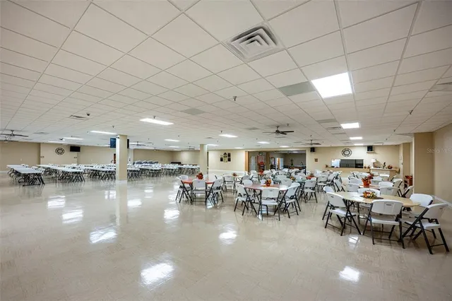 a group of people sitting in a room