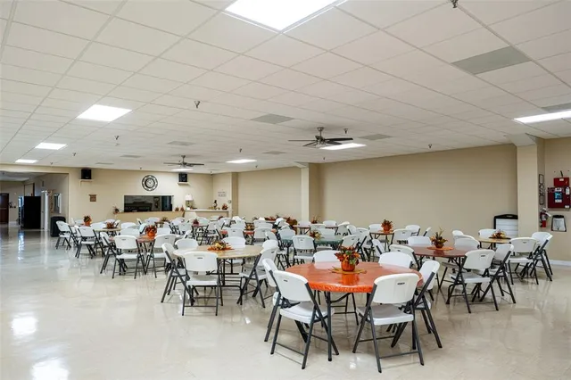 a group of people sitting in a living room