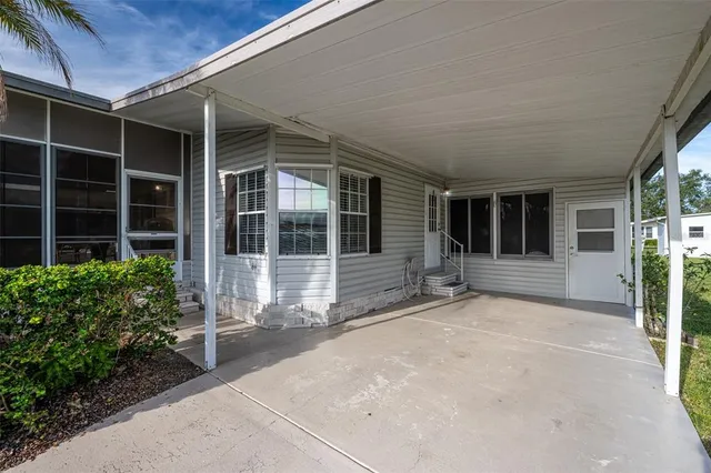 a view of house with front door