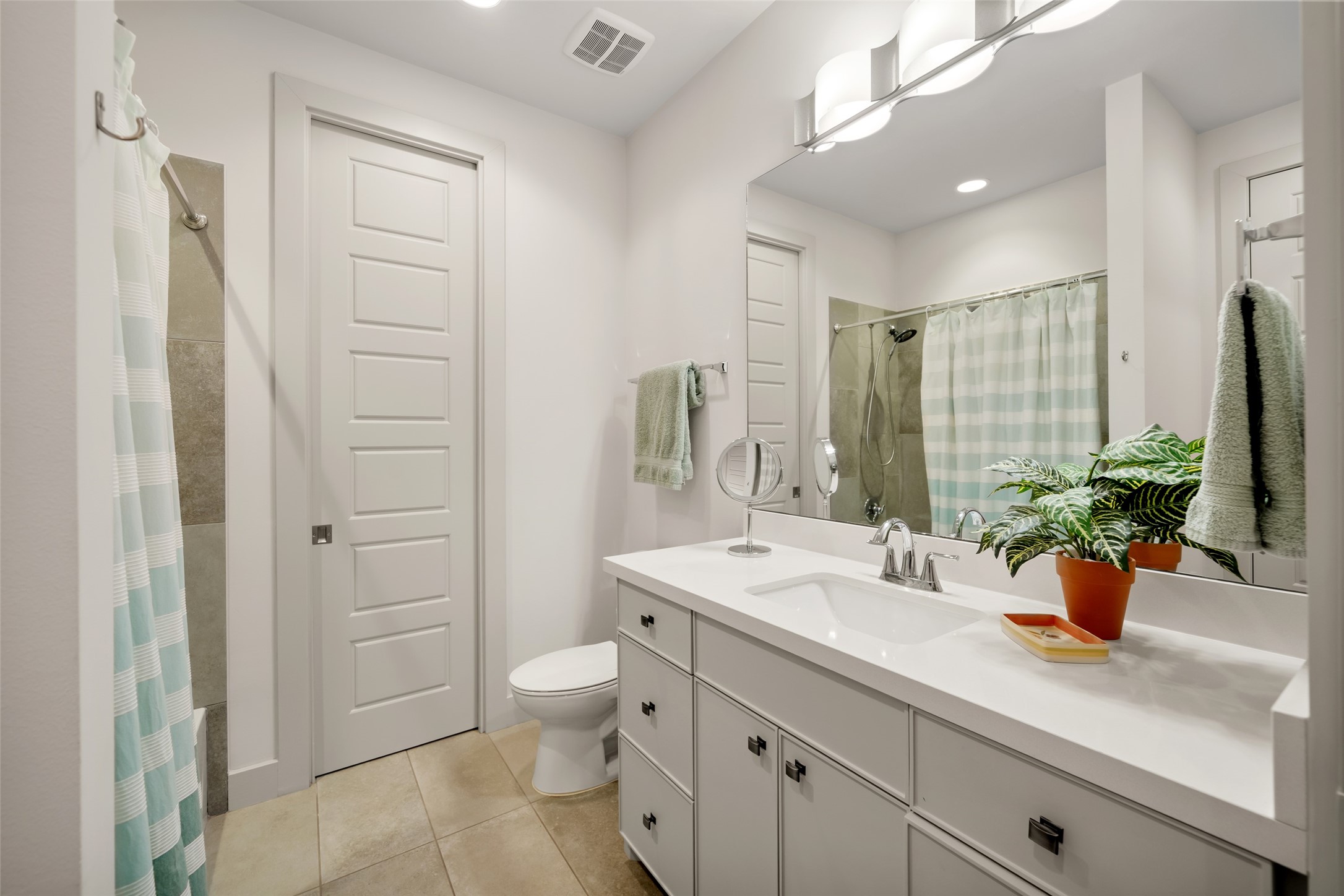 24902 Delaney Knoll Spring, TX 77389 - Photo 33 of 49 a spacious bathroom with a granite countertop sink a toilet and shower