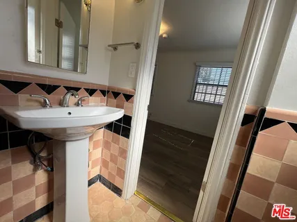 a view of a house with a large window