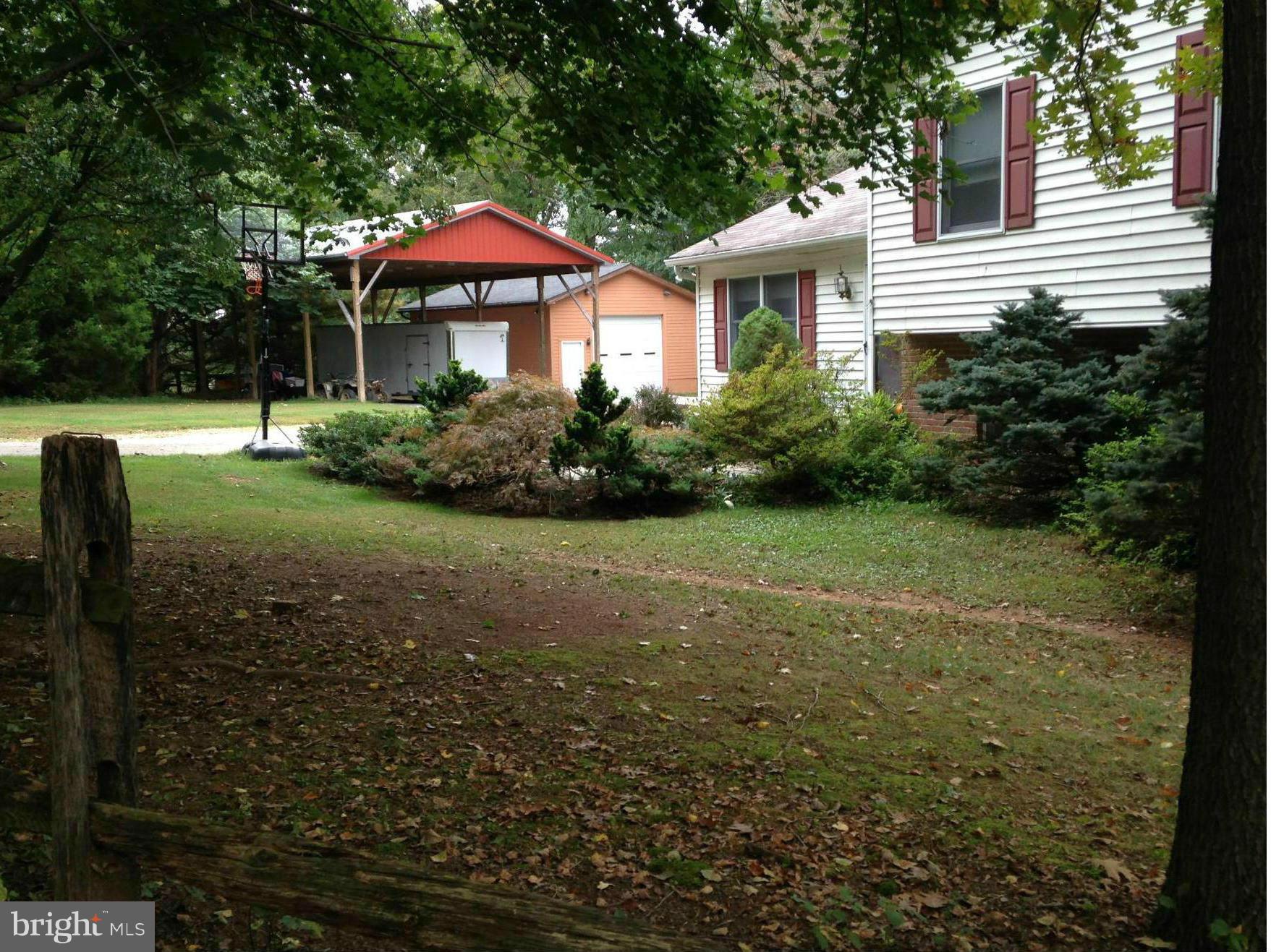 18608 Upper Beckleysville Road Hampstead, MD 21074 - Photo 2 of 29 a front view of a house with garden
