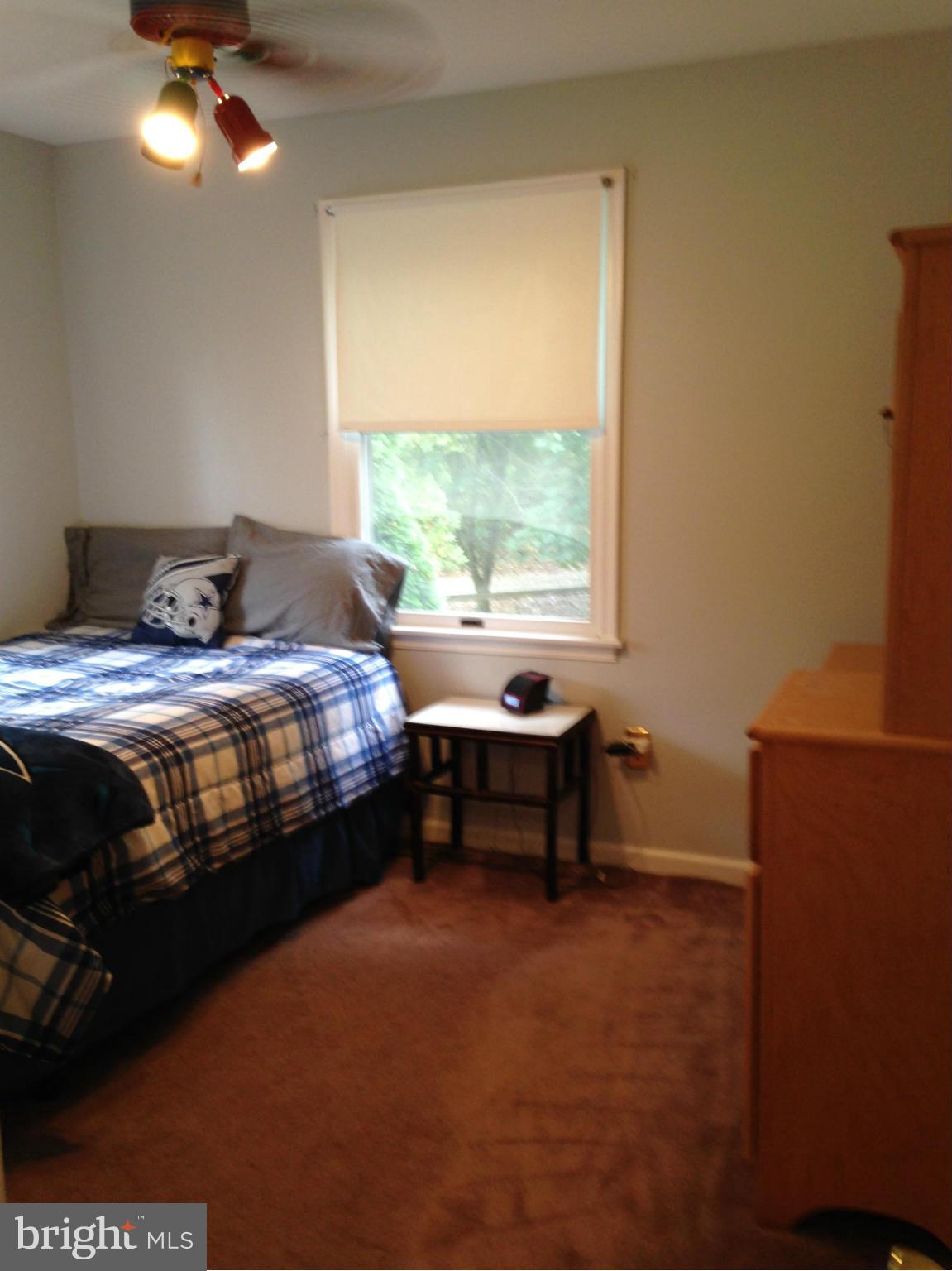 18608 Upper Beckleysville Road Hampstead, MD 21074 - Photo 25 of 29 a bedroom with a bed and a window