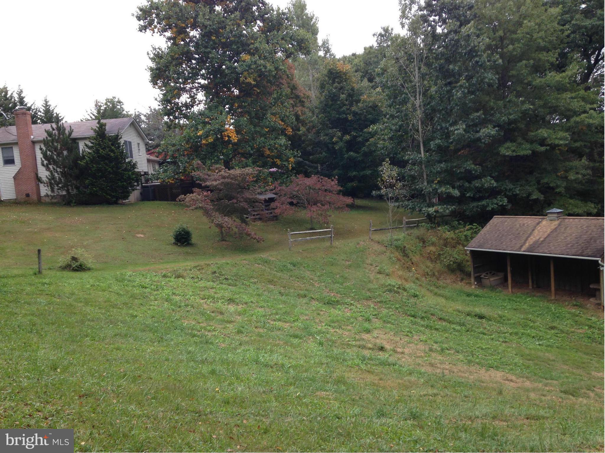 18608 Upper Beckleysville Road Hampstead, MD 21074 - Photo 5 of 29 a backyard of a house with lots of green space