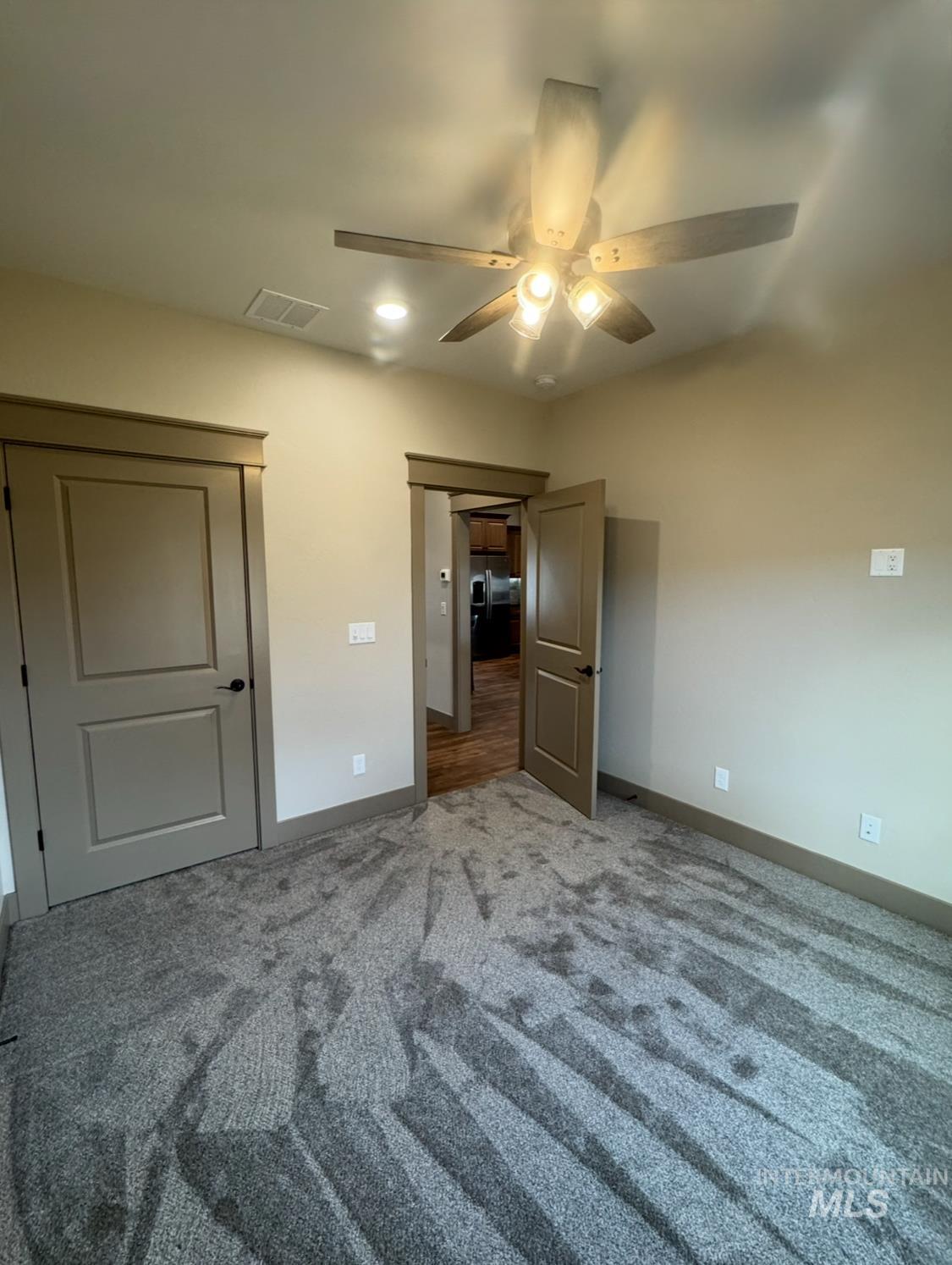 1346 Zephlyn Street Twin Falls, ID 83301 - Photo 23 of 34 Unfurnished bedroom featuring carpet floors and a ceiling fan